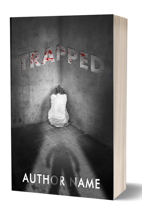 Book cover for "Trapped" by AUTHOR NAME. The cover shows a person in a white garment sitting curled up in a dimly lit, empty corner with a distressed texture. Blood-splattered title text hovers above, with a looming shadow of a person cast on the floor in the foreground. BookSelf Book Cover Design & Premade Book Covers